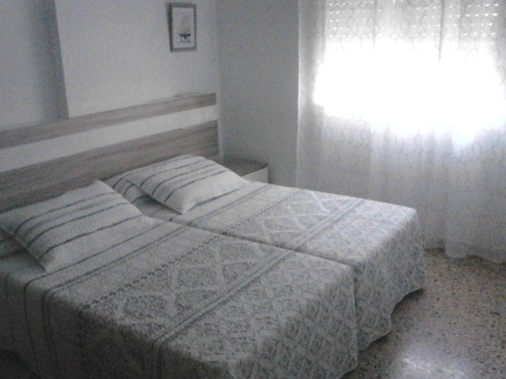 Posteľ alebo postele v izbe v ubytovaní Apartamento Parque playa
