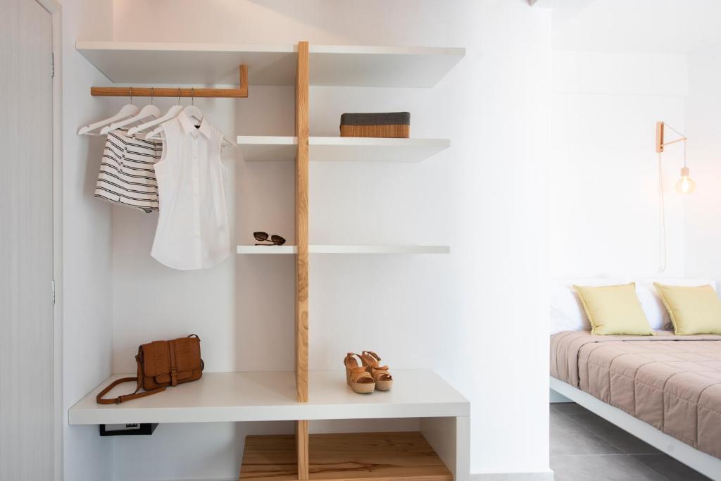 Postel nebo postele na pokoji v ubytování Valery Suites