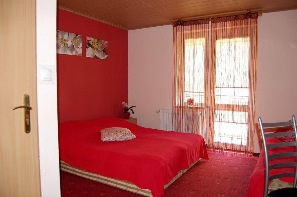 Łóżko lub łóżka w pokoju w obiekcie Villa Orchidea