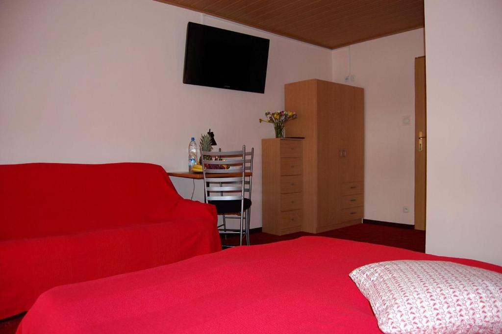 Telewizja i/lub zestaw kina domowego w obiekcie Villa Orchidea