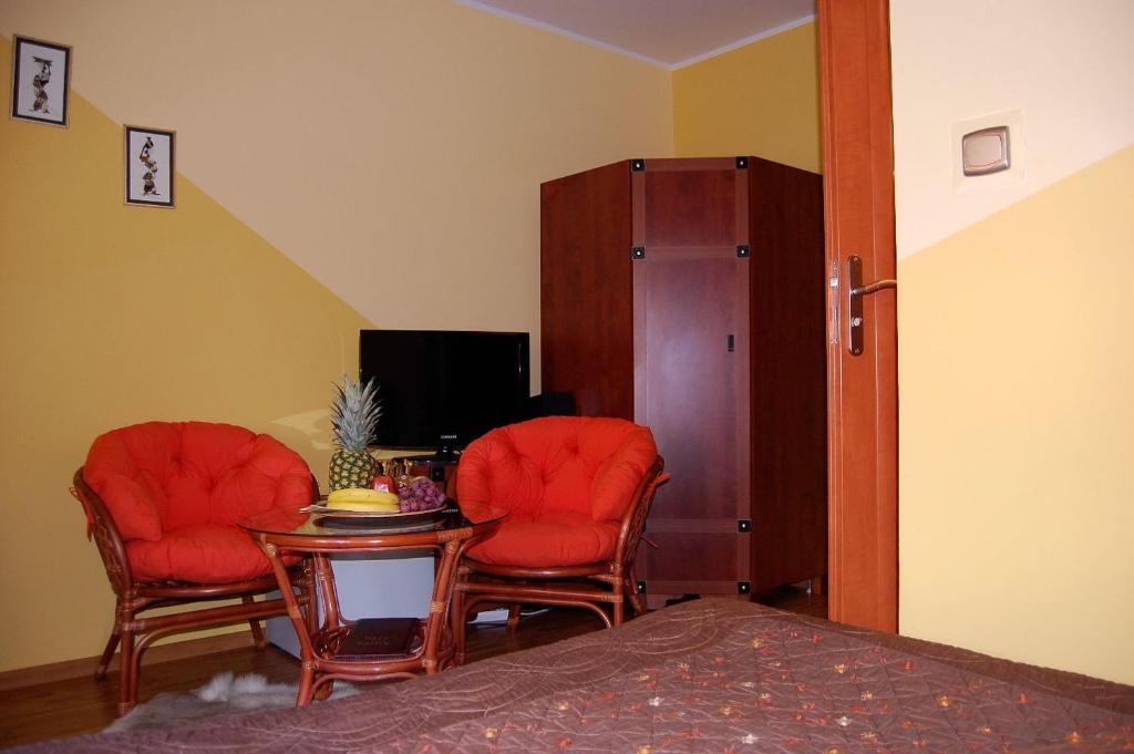 Telewizja i/lub zestaw kina domowego w obiekcie Villa Orchidea