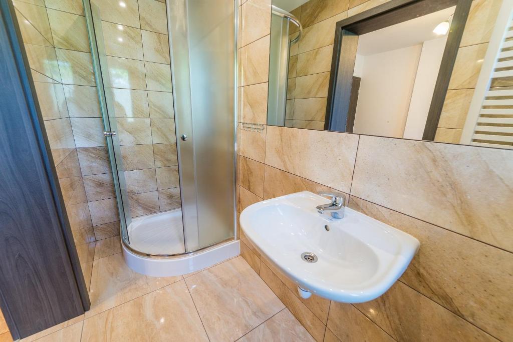 Kúpeľňa v ubytovaní Villa Mikołajki Popiełuszki 8