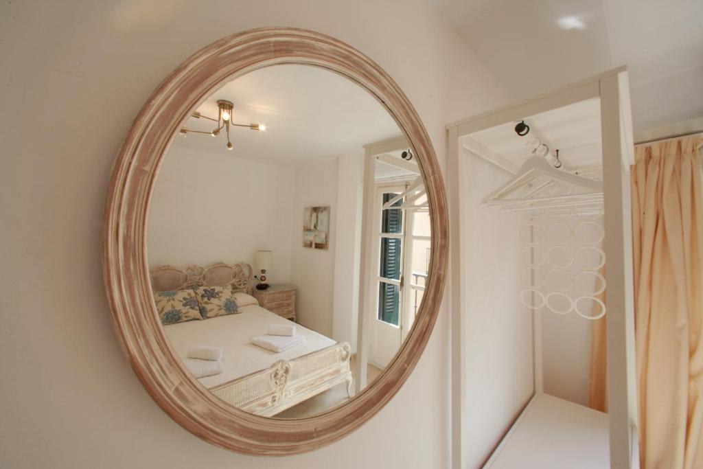 Łóżko lub łóżka w pokoju w obiekcie Casa Volare- estilo y relax en pleno casco antiguo