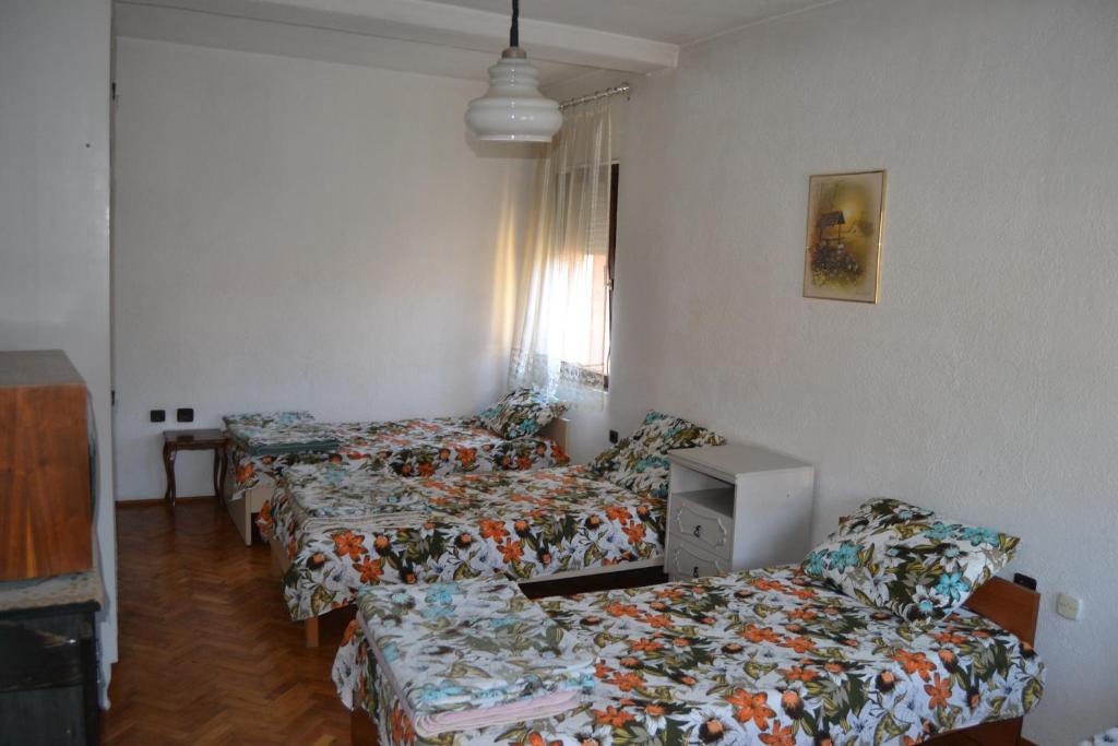 Postel nebo postele na pokoji v ubytování Hostel Valentin