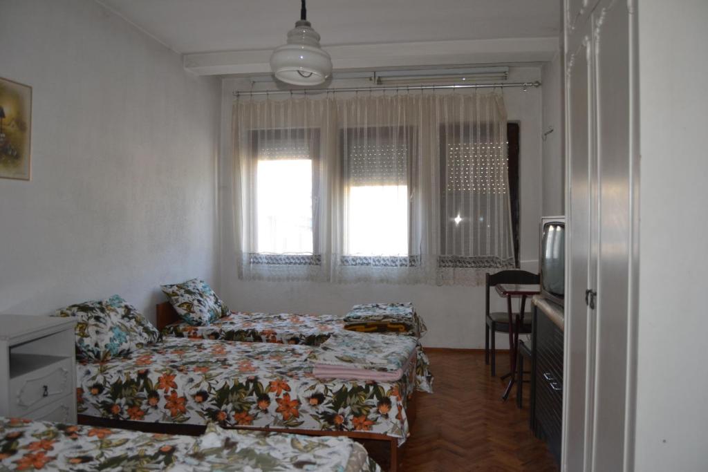 Postel nebo postele na pokoji v ubytování Hostel Valentin