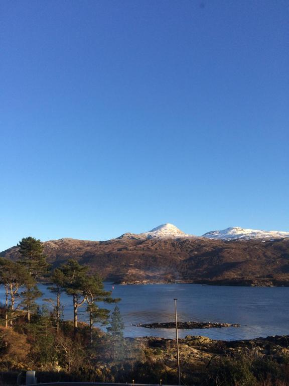 a view of a lake with mountains in the background at Lochalsh View en suite Kyle near Skye in Kyle of Lochalsh