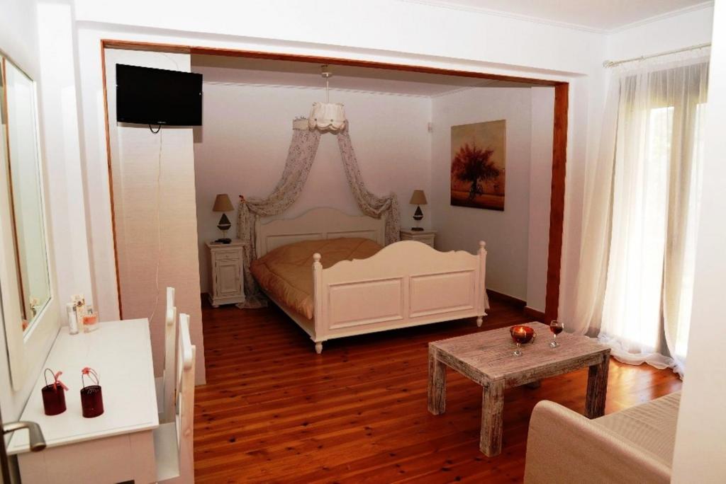 Televízia a/alebo spoločenská miestnosť v ubytovaní Dio Guesthouses