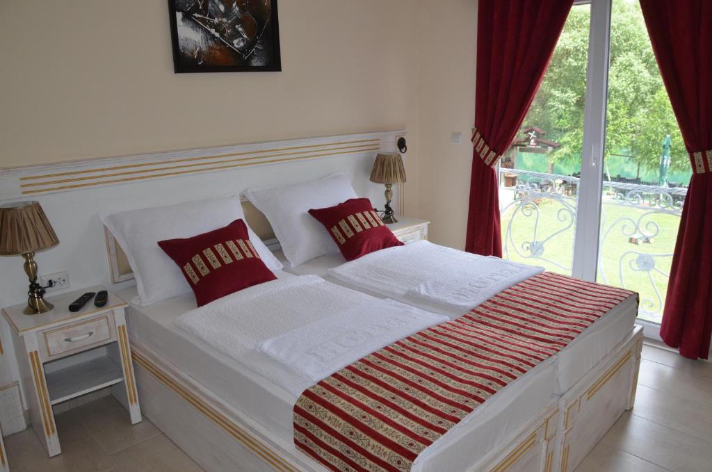 Postel nebo postele na pokoji v ubytování Rooms and Apartments Neron Bihać
