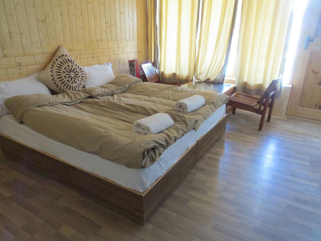 Кровать или кровати в номере Laksdup Guest House