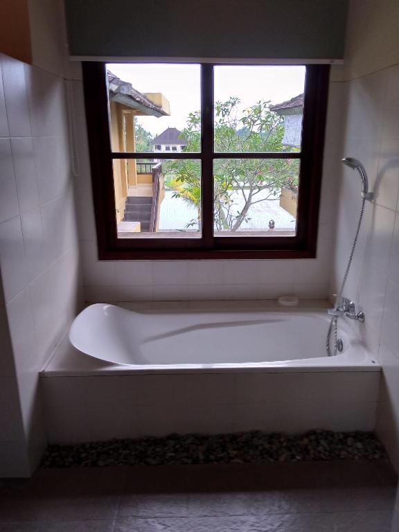 Koupelna v ubytování Ubud Lestari Bungalows