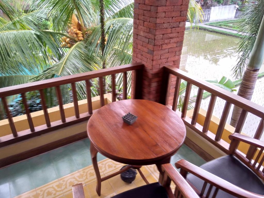 Balkón nebo terasa v ubytování Ubud Lestari Bungalows