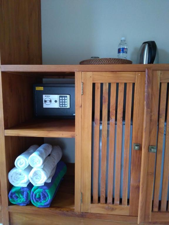 Postel nebo postele na pokoji v ubytování Ubud Lestari Bungalows