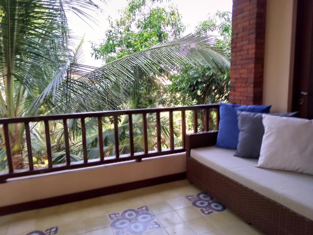 Balkón nebo terasa v ubytování Ubud Lestari Bungalows