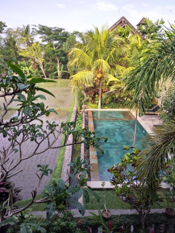 Bazén v ubytování Ubud Lestari Bungalows nebo v jeho okolí