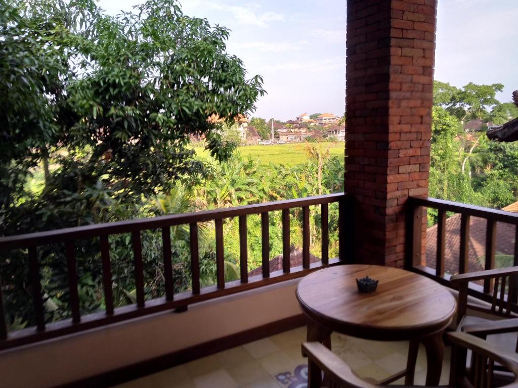 Balkón nebo terasa v ubytování Ubud Lestari Bungalows