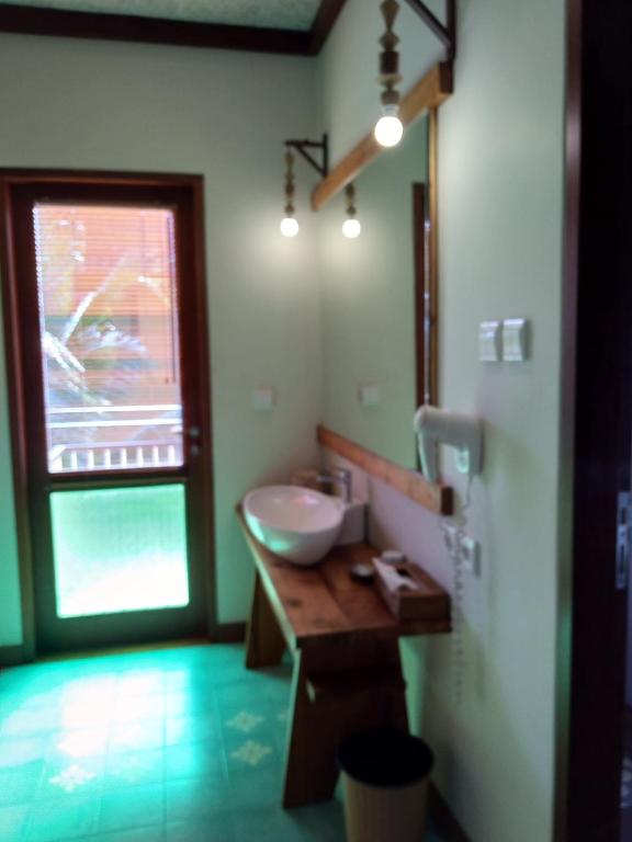 Koupelna v ubytování Ubud Lestari Bungalows