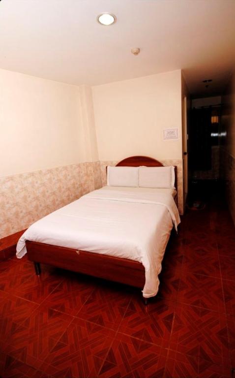 Postel nebo postele na pokoji v ubytování Hotel 45 Extension