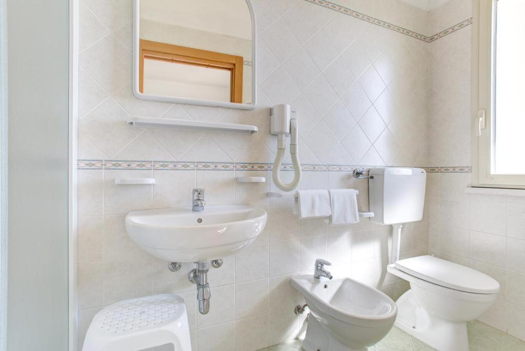Kúpeľňa v ubytovaní Hotel Amedea