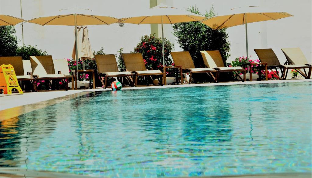 Swimmingpoolen hos eller tæt på Olivias Group Hotel
