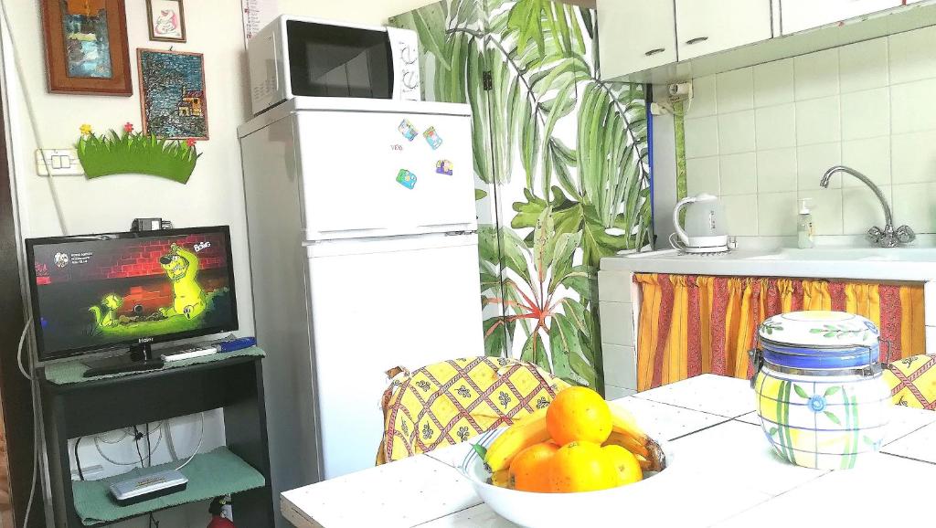 A kitchen or kitchenette at Casa Elena Al Duomo