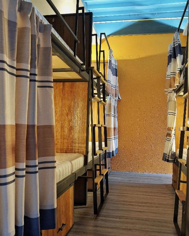 Postel nebo postele na pokoji v ubytování Whereder Poshtel