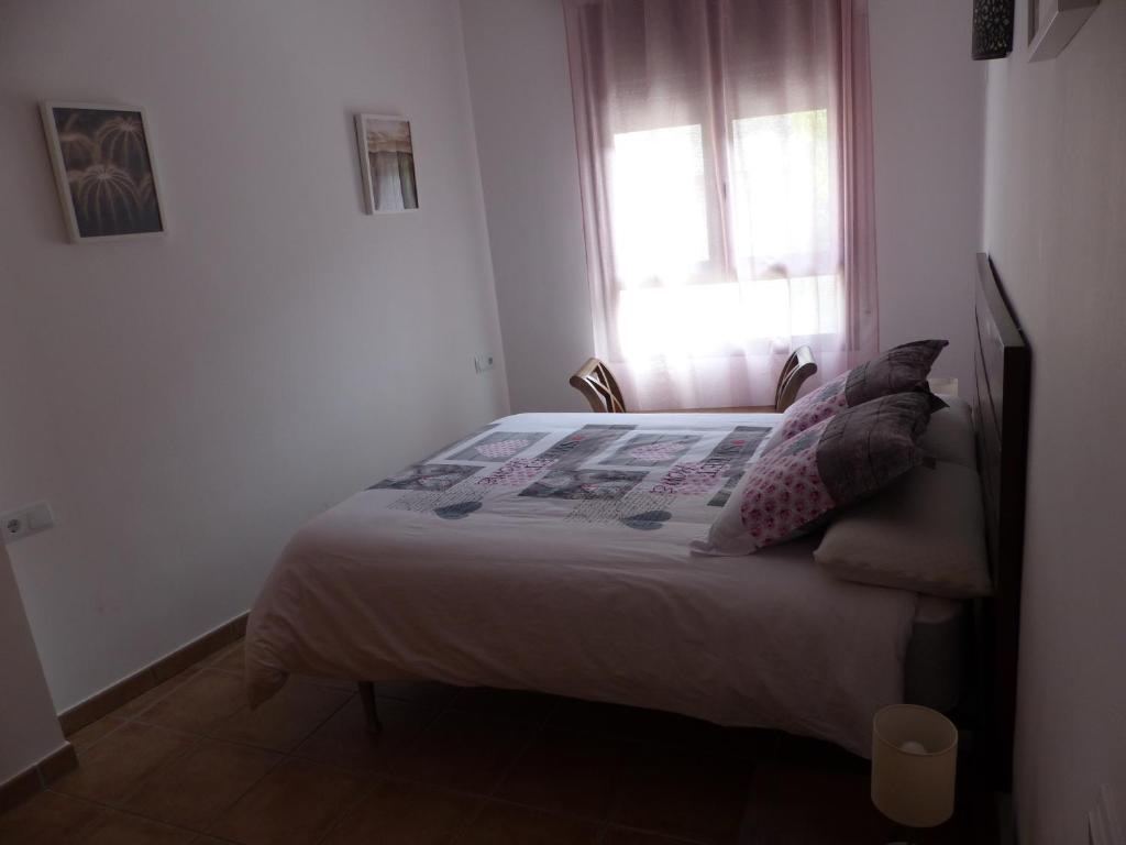 Postel nebo postele na pokoji v ubytování Apartament Valls d'Aneu