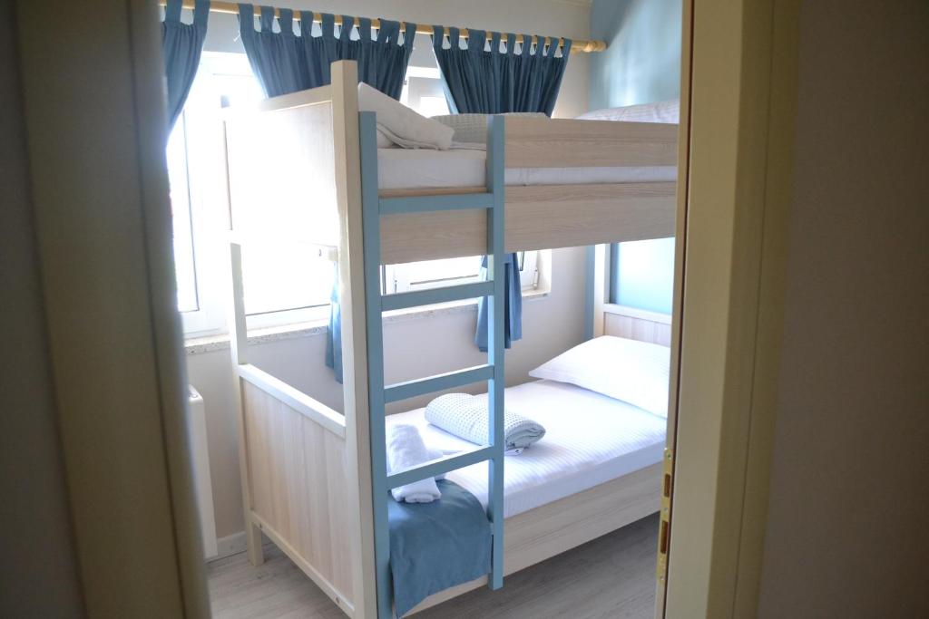 Postel nebo postele na pokoji v ubytování Open Doors Bed & Breakfast