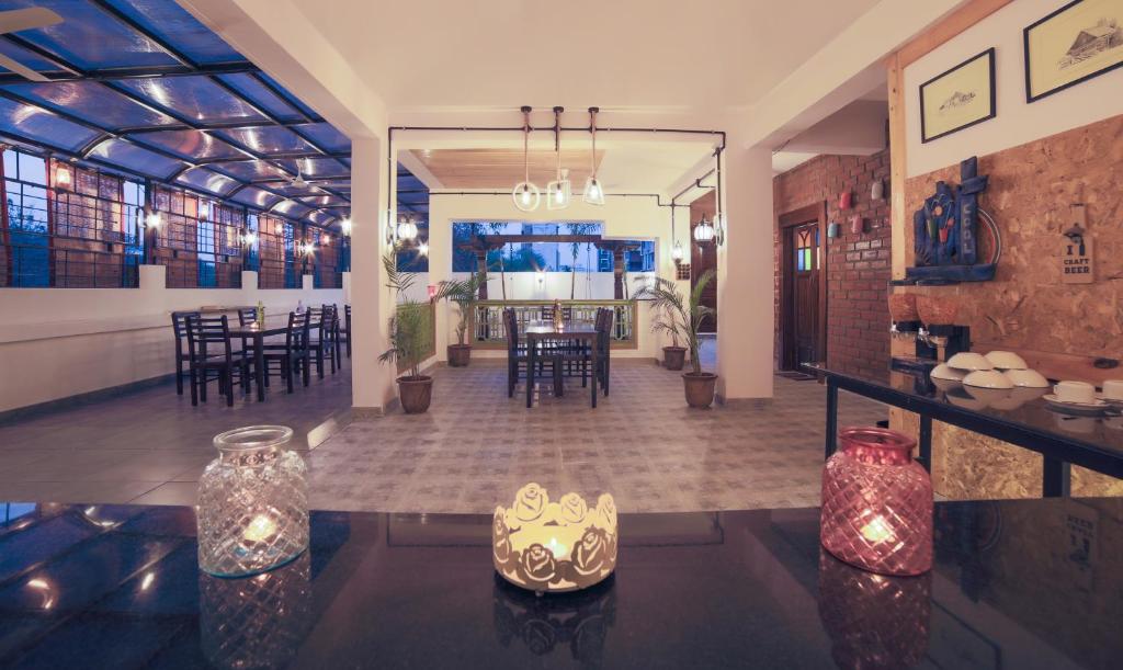 Restaurace v ubytování Treebo Chalets, Nagpur Airport