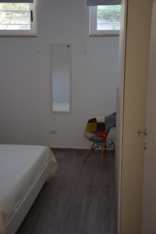 Posteľ alebo postele v izbe v ubytovaní Dimora Santa Caterina