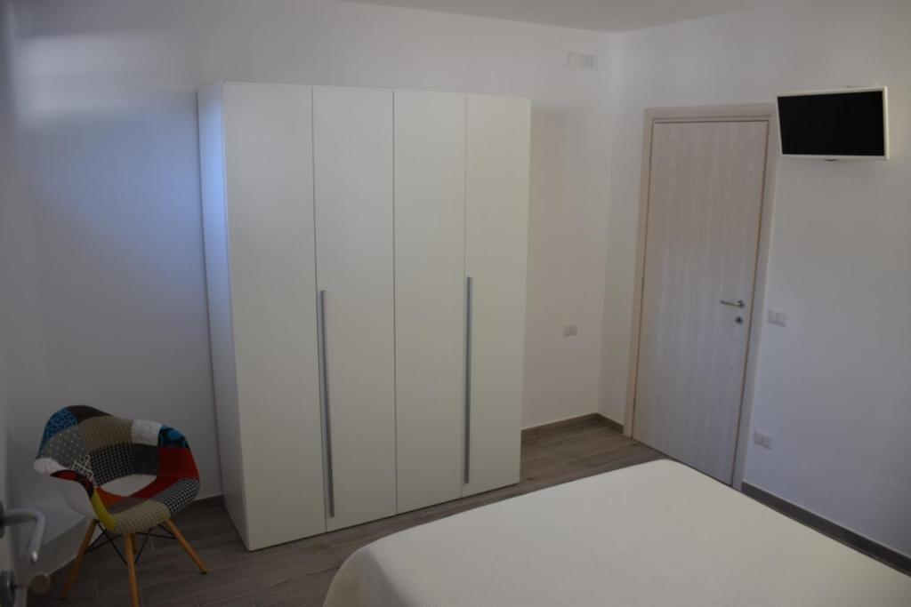 Posteľ alebo postele v izbe v ubytovaní Dimora Santa Caterina