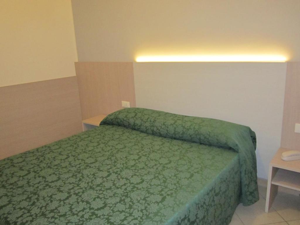 Postel nebo postele na pokoji v ubytování HOTEL ANDREA'S