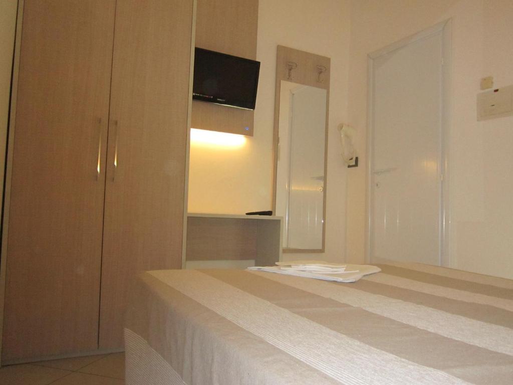 Postel nebo postele na pokoji v ubytování HOTEL ANDREA'S