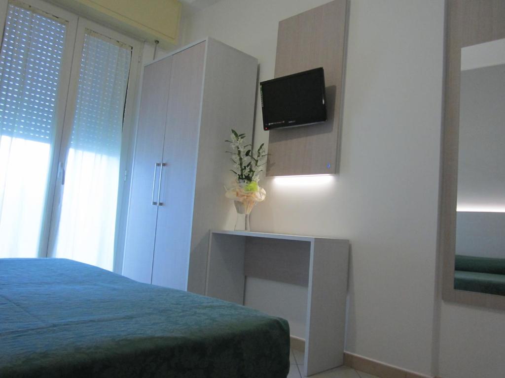 Postel nebo postele na pokoji v ubytování HOTEL ANDREA'S