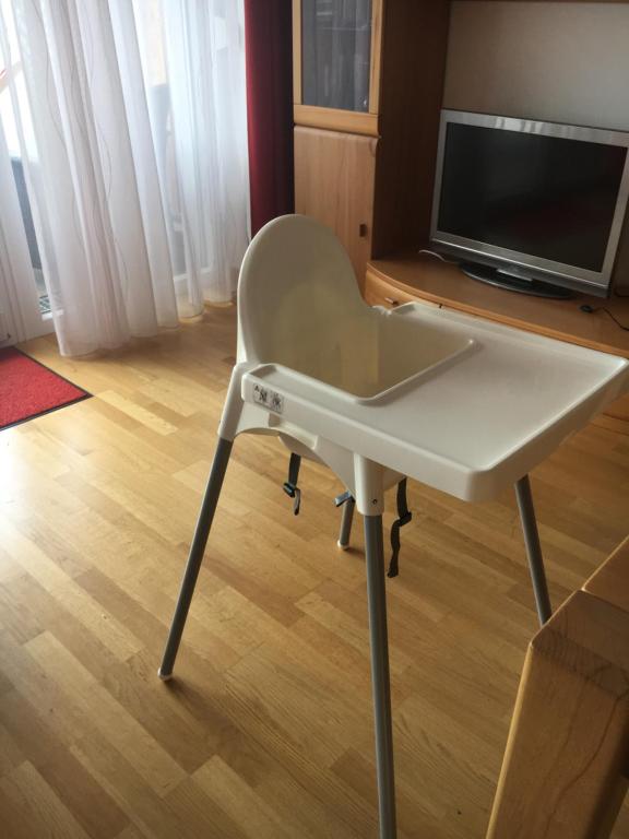 Televízia a/alebo spoločenská miestnosť v ubytovaní Nassfeld Mountain Apartments