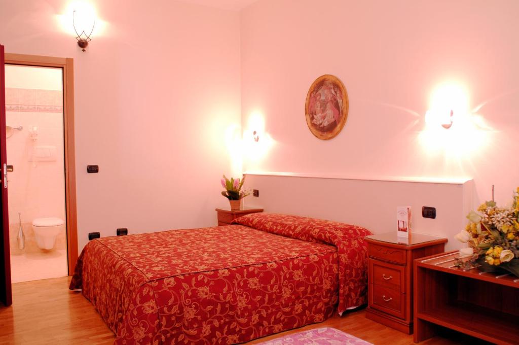 Łóżko lub łóżka w pokoju w obiekcie Hotel HDomus