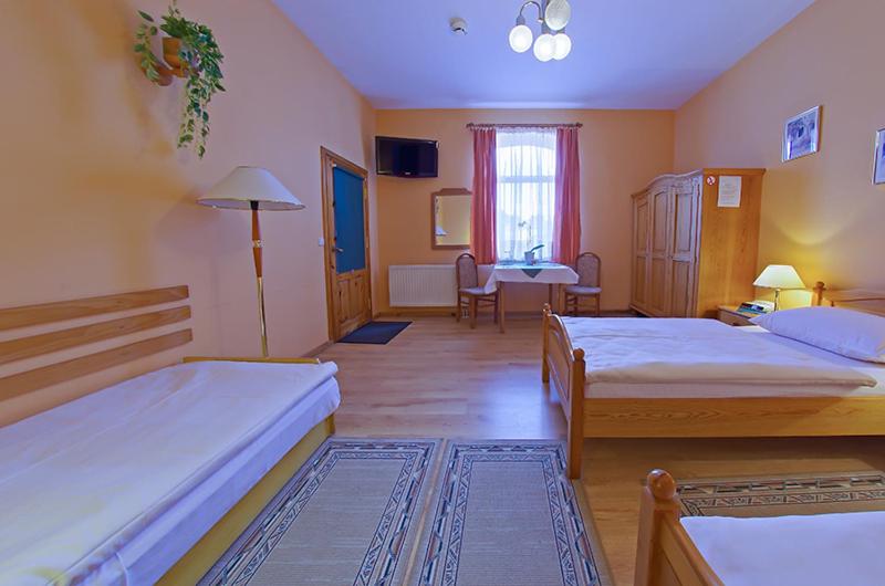 Posteľ alebo postele v izbe v ubytovaní Hotel Alga
