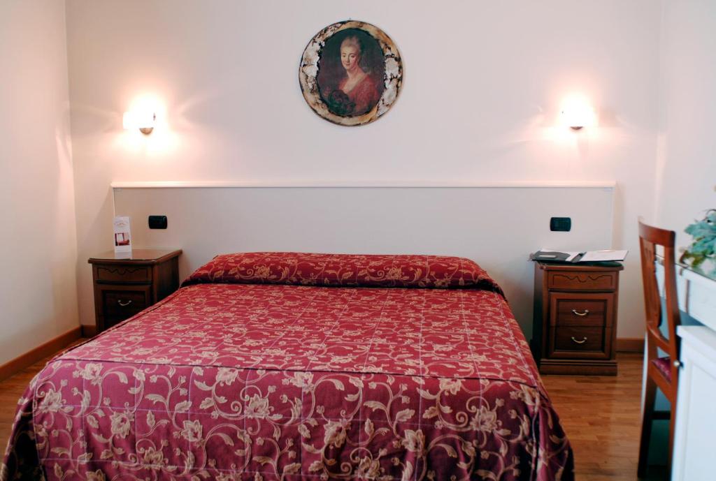 Łóżko lub łóżka w pokoju w obiekcie Hotel HDomus
