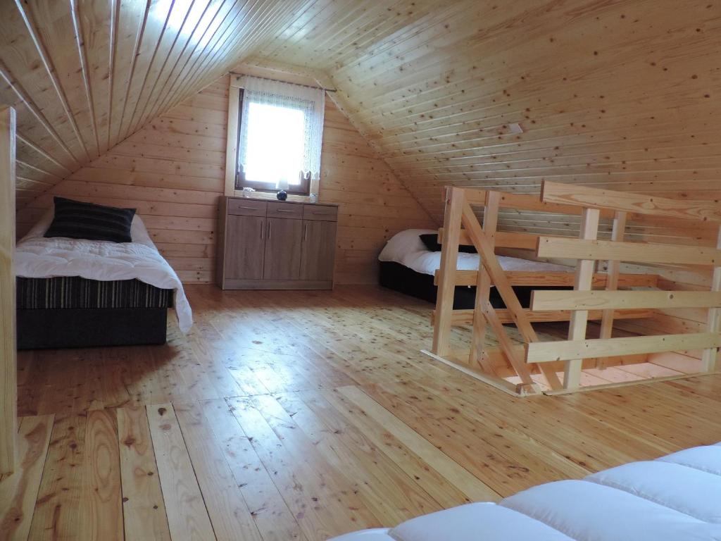 Postel nebo postele na pokoji v ubytování Kayman