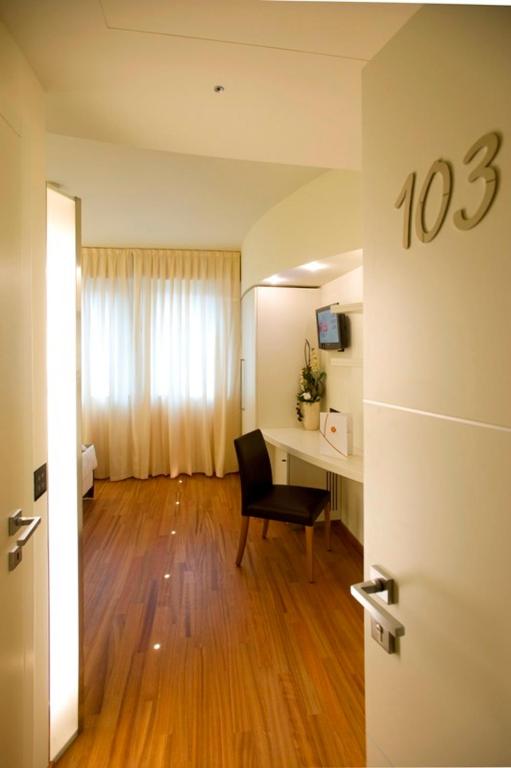 TV a/nebo společenská místnost v ubytování Hotel Napoleon
