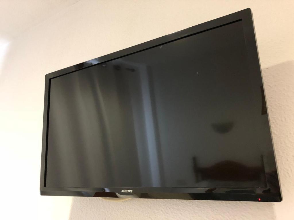 TV a/nebo společenská místnost v ubytování Hostal 82