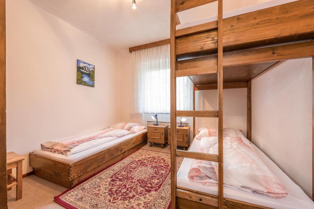 Postel nebo postele na pokoji v ubytování Ski- und Wander Appartements Schiffer
