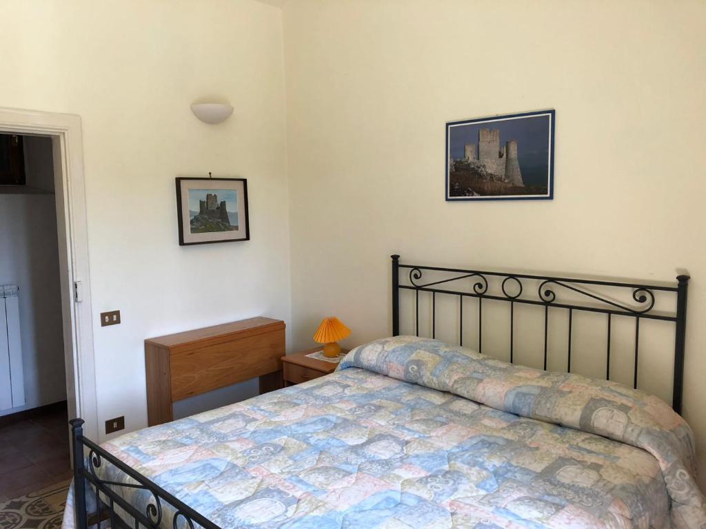 Postel nebo postele na pokoji v ubytování Ammoglja