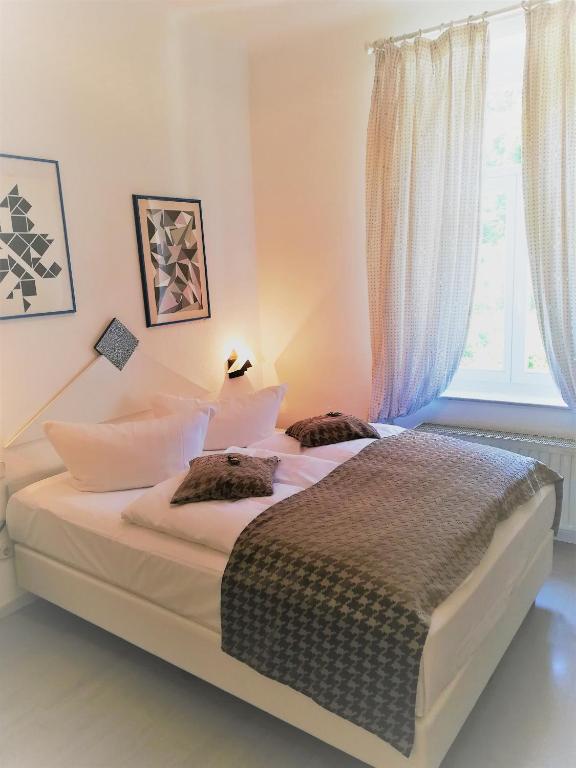 Postel nebo postele na pokoji v ubytování Design-Hotel Zur Abtei