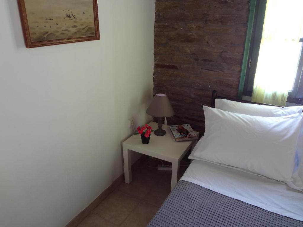 Łóżko lub łóżka w pokoju w obiekcie Palm Beach House