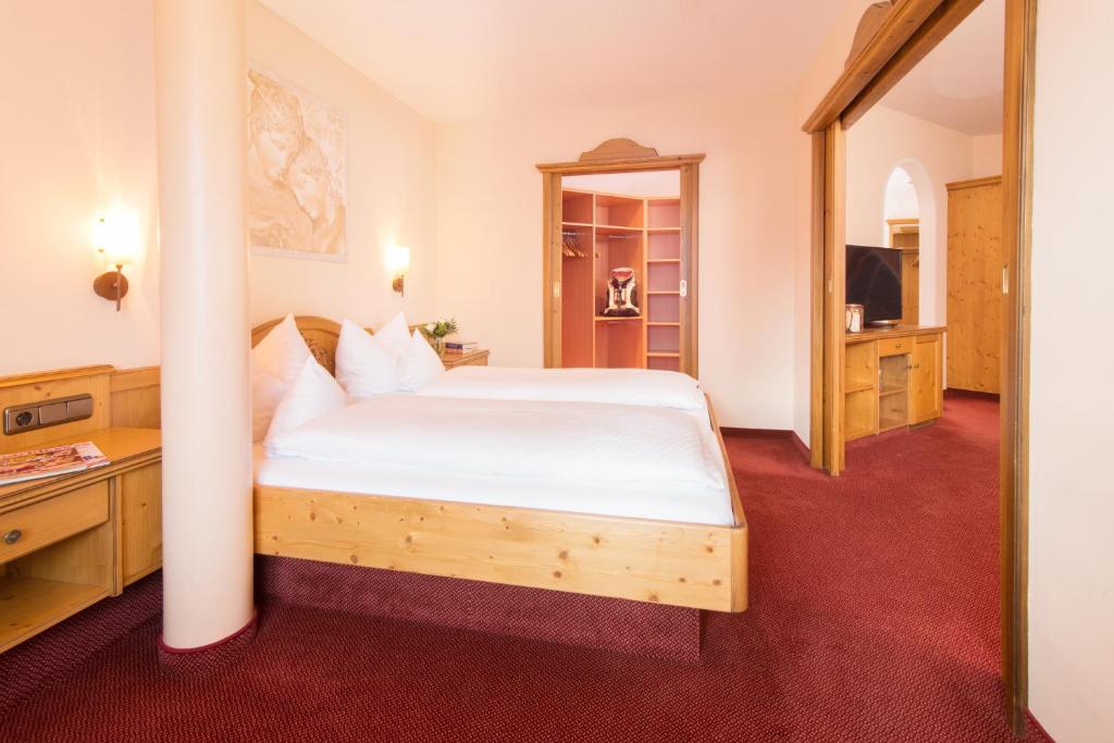 Postel nebo postele na pokoji v ubytování Hotel Alte Krone