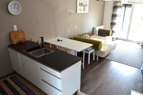 A bed or beds in a room at Hannajo apartman