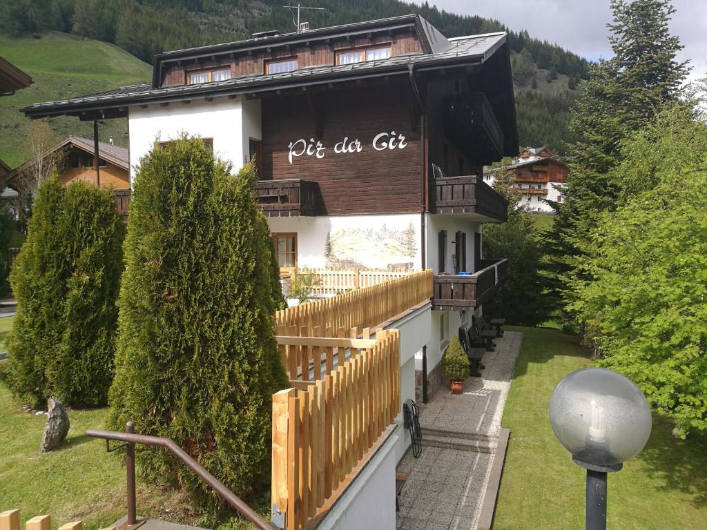 a house with a sign on the side of it at Piz da Cir in Colfosco