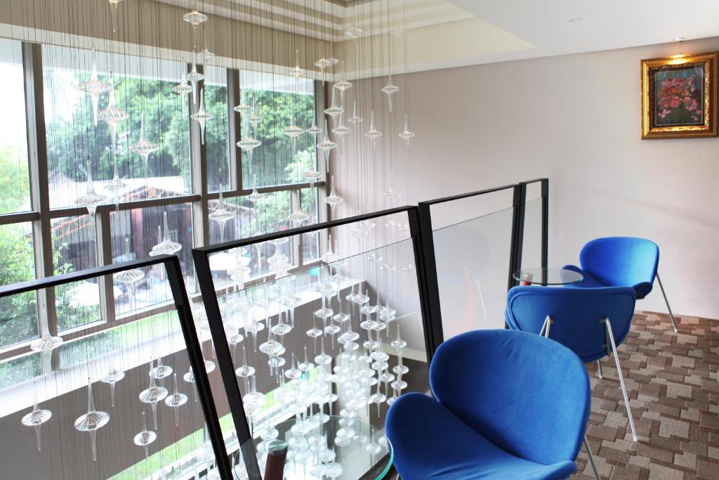 Posezení v ubytování Micasa Hotel