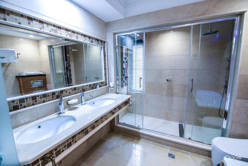 Koupelna v ubytování Hotel Restaurant Vila Ime Voskopoje