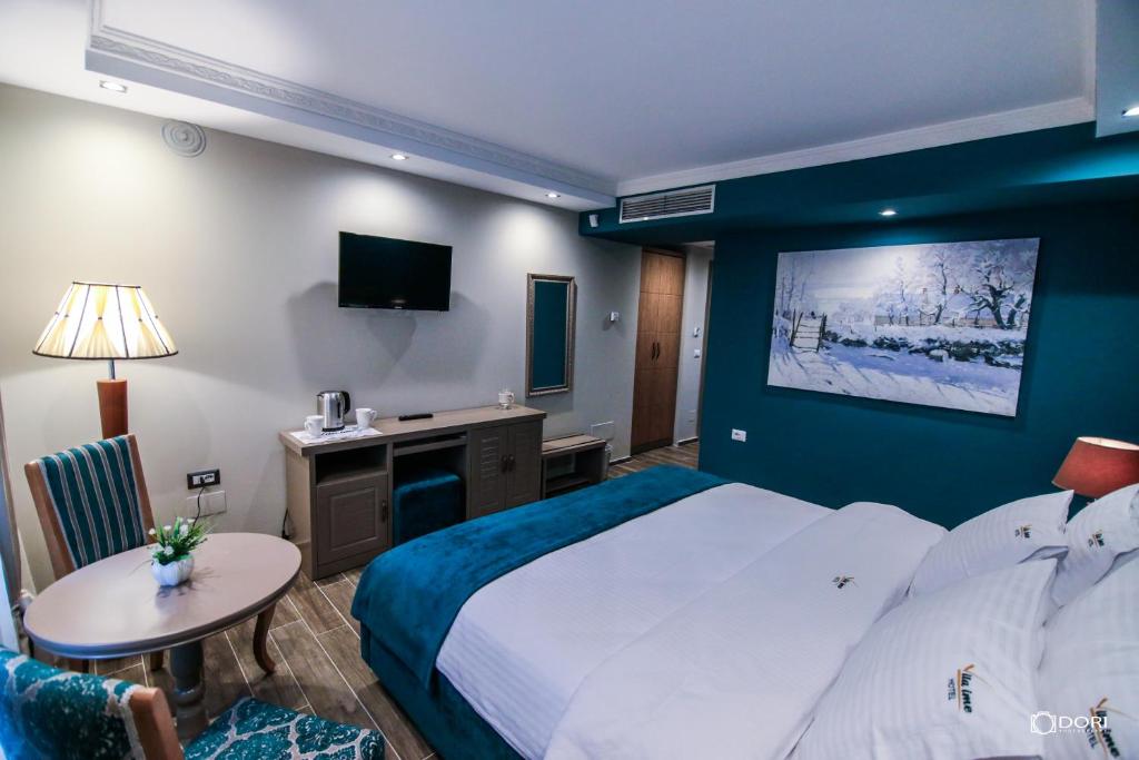 TV a/nebo společenská místnost v ubytování Hotel Restaurant Vila Ime Voskopoje